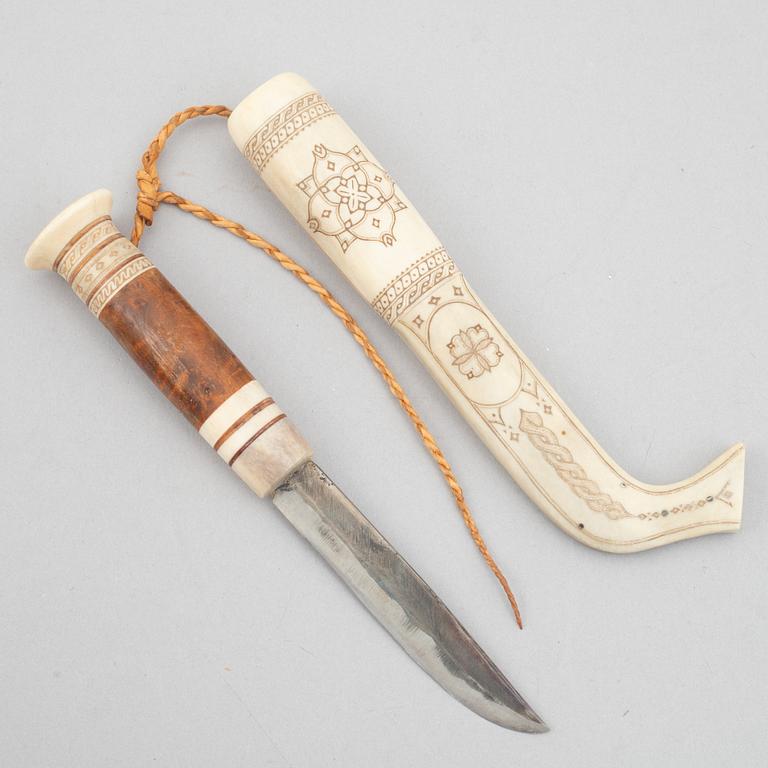 Olof Tomas Svonni, a reindeer horn knife, signed.