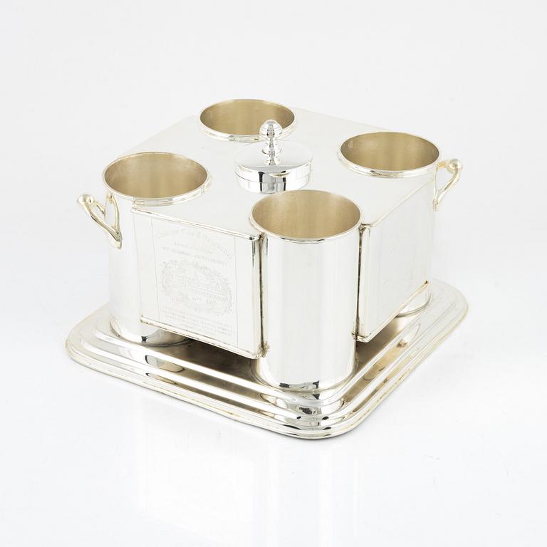A contemporary silver plated wine cooler.