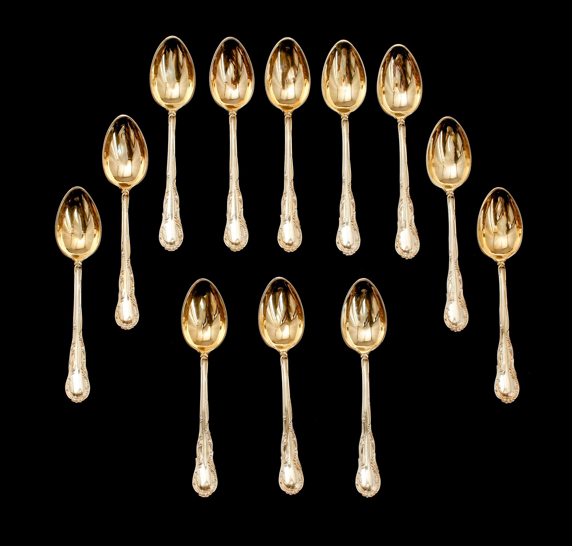 KAFFESKEDAR, 12 st, förgyllt silver, 1897. Vikt ca 159 g.