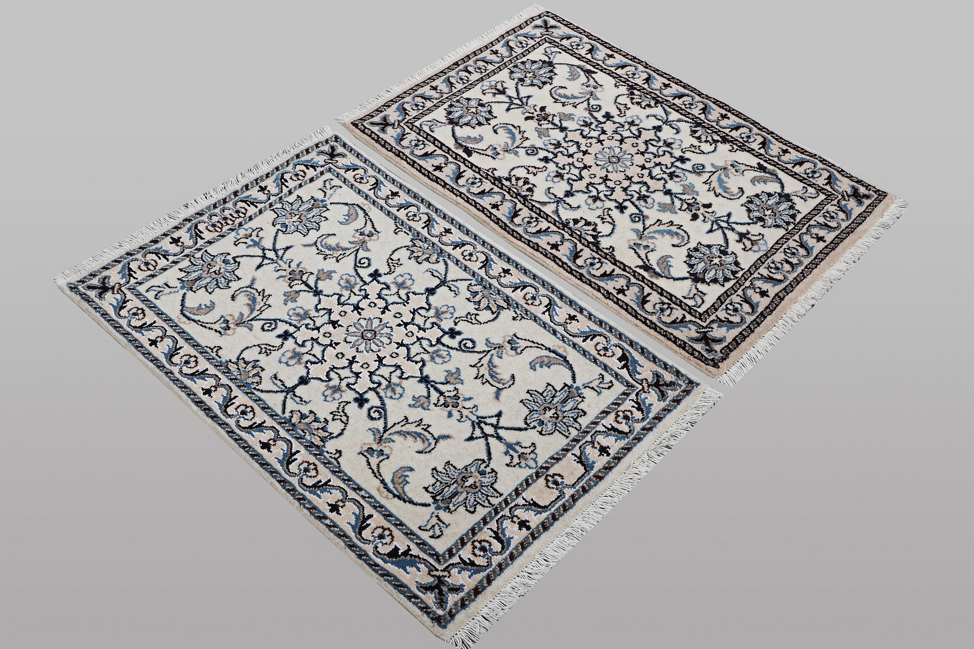 A pair of rugs, Nain, part silk, ca 90 x 60 cm & ca 90 x 60 cm.