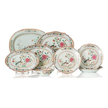 1297. A group of famille rose 'double peacock' serving dishes, Qing dynasty, Qianlong (1736-95). (8 pieces).