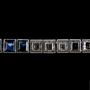 A BRACELET, square cut diamonds 10 pcs. c. 3.5 ct H/VVS, sapphires 15 pcs. c. 5.70 ct.