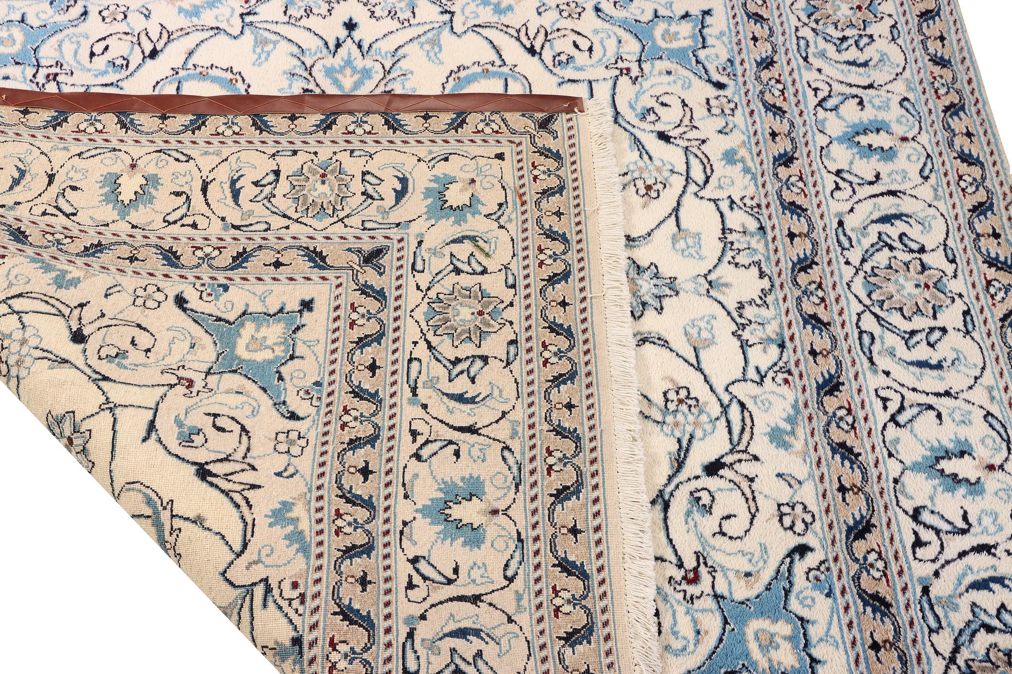 A Nain crug, part silk, c. 200 x 193 cm.