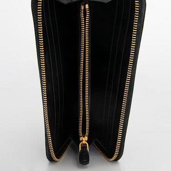 Prada, a wallet.