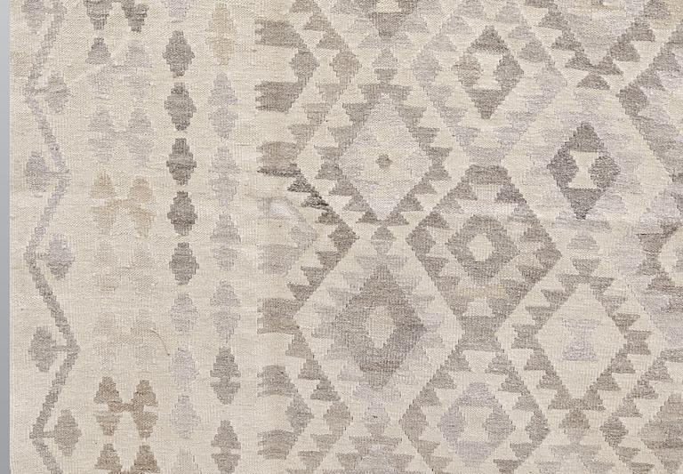A kilim carpet, c 293 x 203.