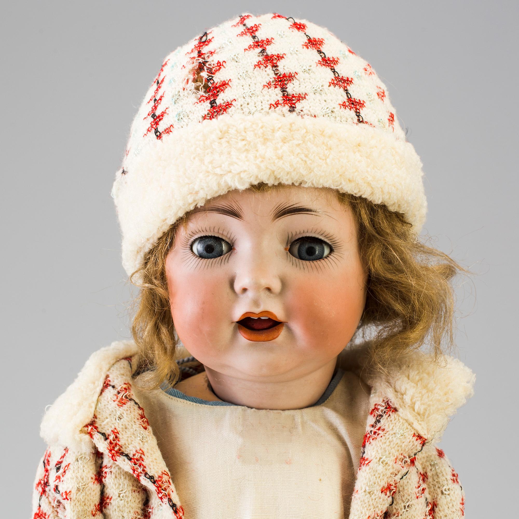 A bisque headed doll, Germany, early 20th century.