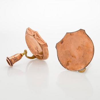 A pair of early 20th century WMF (Württembergische Metallwarenfabrik), candlesticks.