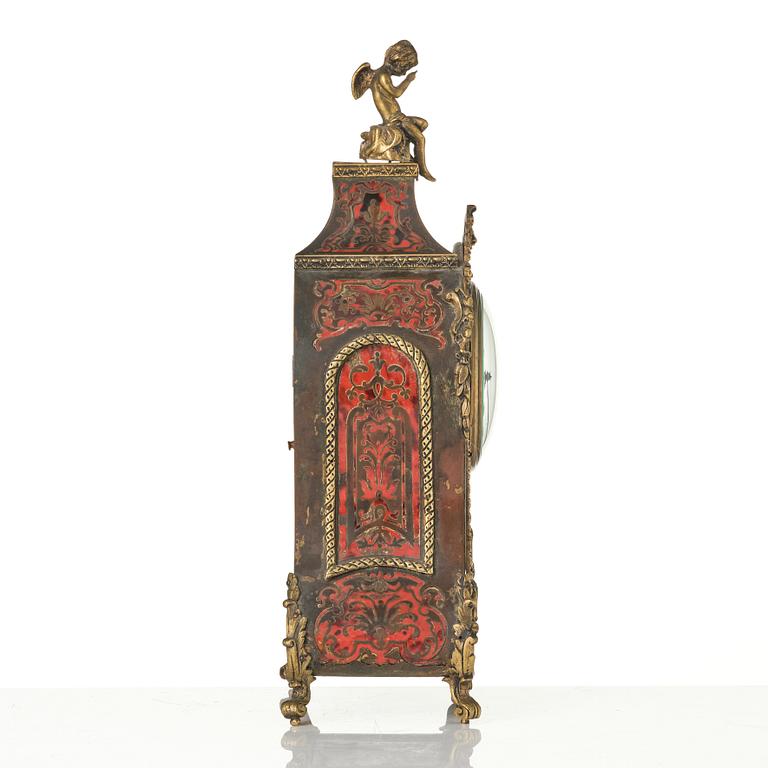 A Rococo-style mantle clock, around 1900.