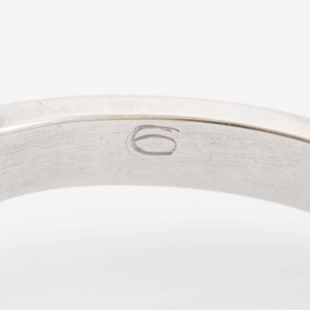 Ring, 18K vitguld med små diamanter.