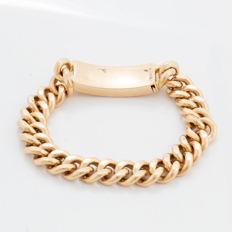 A 14K gold bracelet.