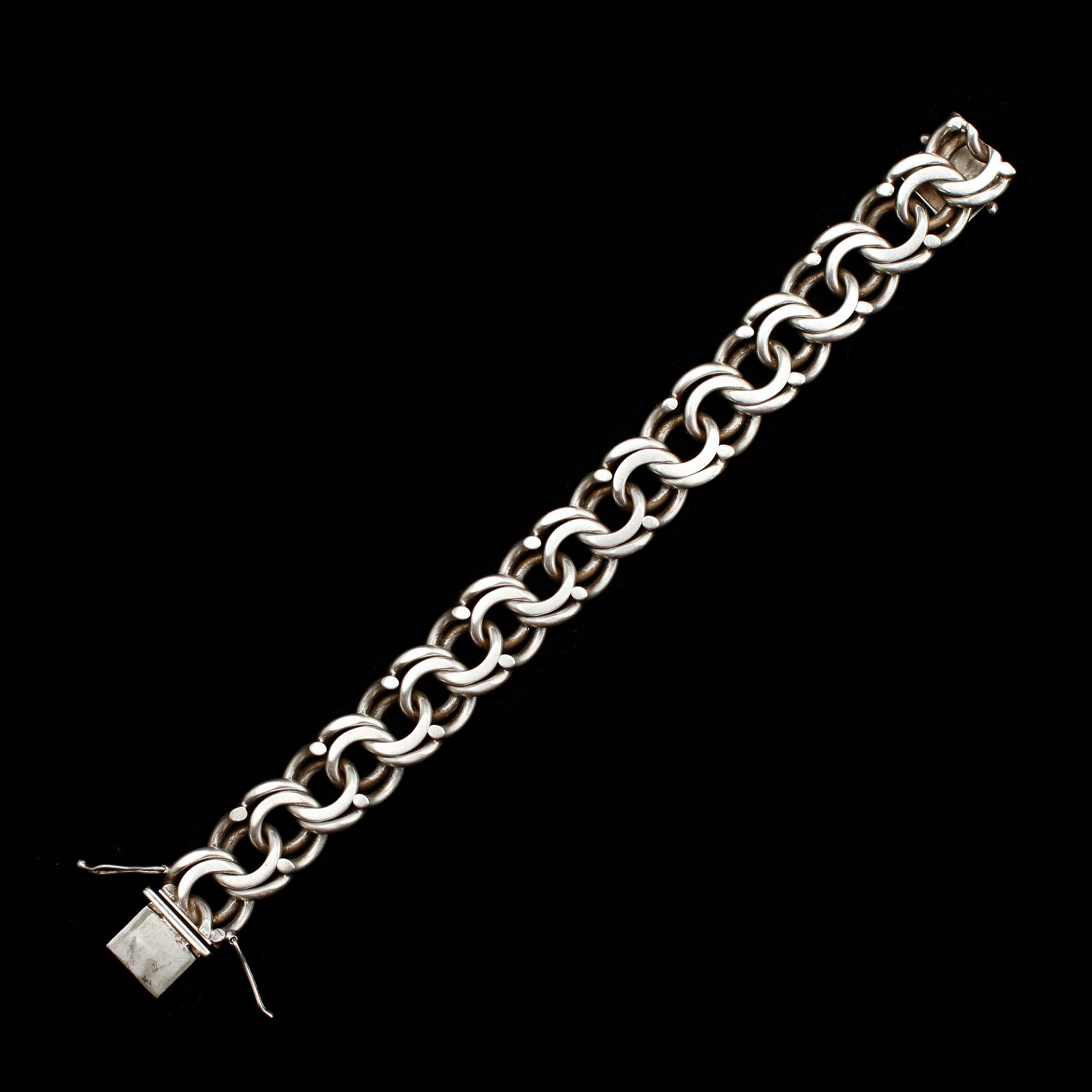 ARMBAND, silver, J&A 1977. Vikt 77 g.