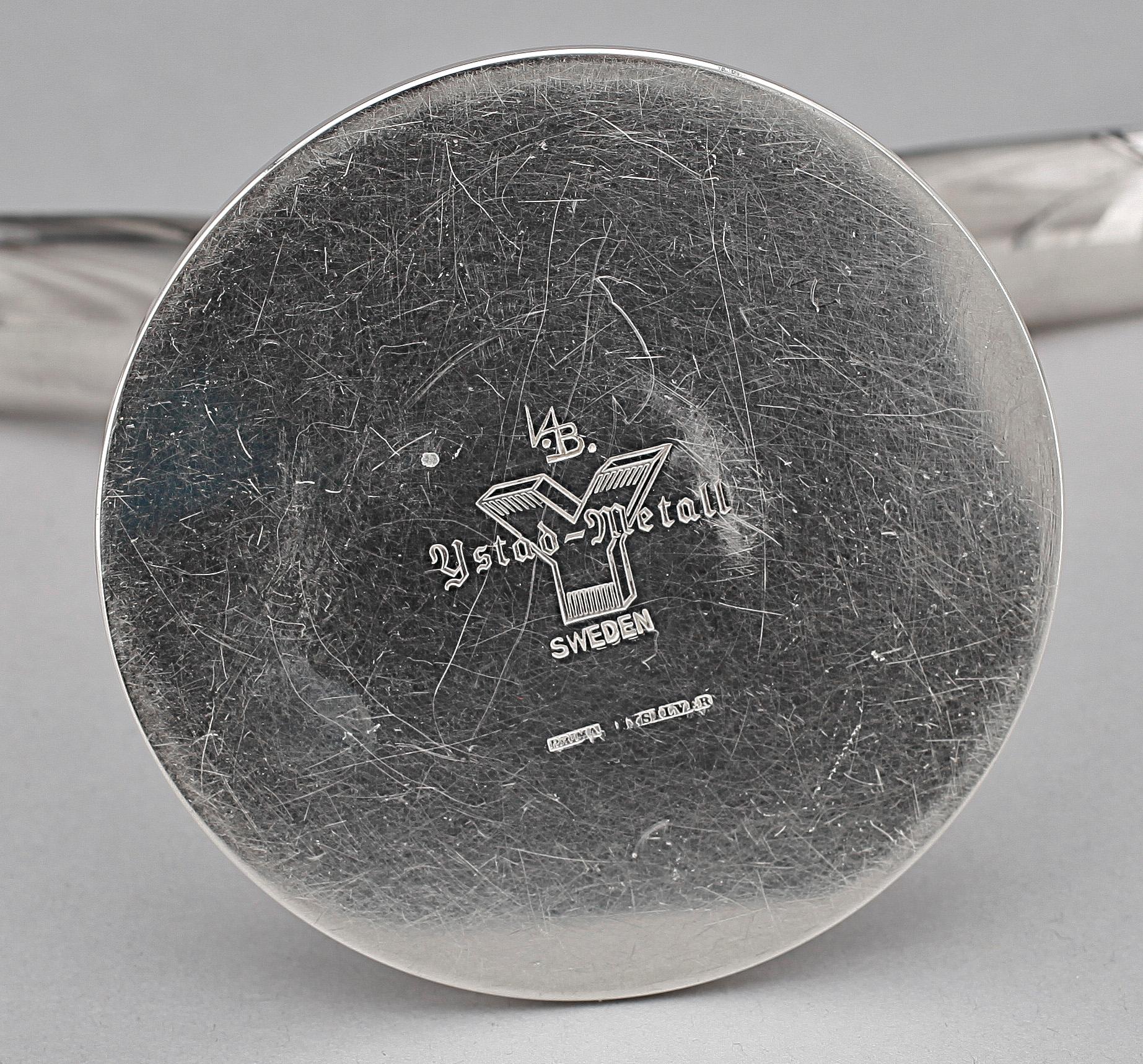 LJUSSTAKAR, ett par,  nysilver, "Liljan", Ivar Ålenius Björk, Ystad metall, 1900-tal.