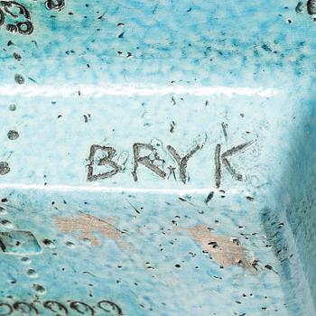 Rut Bryk, plates, as well as plate/wall relief, stoneware.