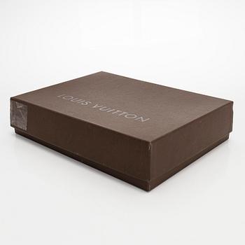 Louis Vuitton, a 'Pochette Montaigne' bag.