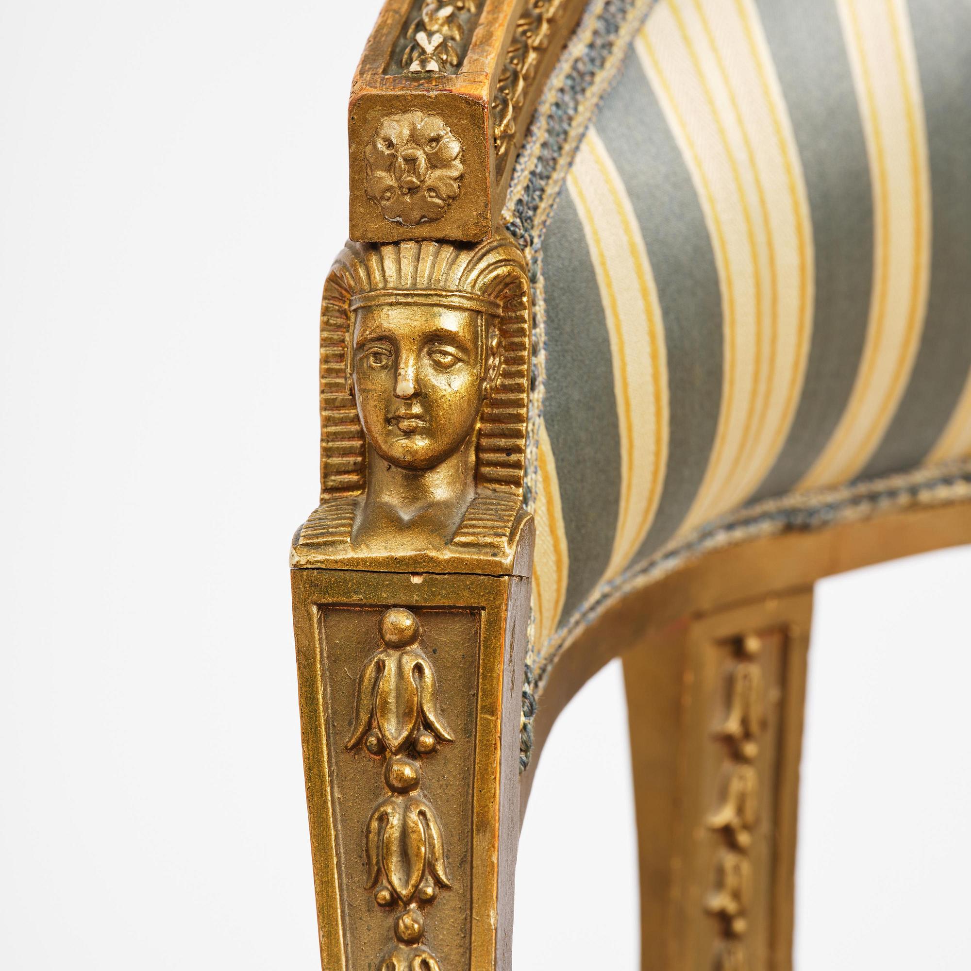 A pair of late Gustavian open armchairs attributed to E. Ståhl (master in Stockholm 1794-1820).