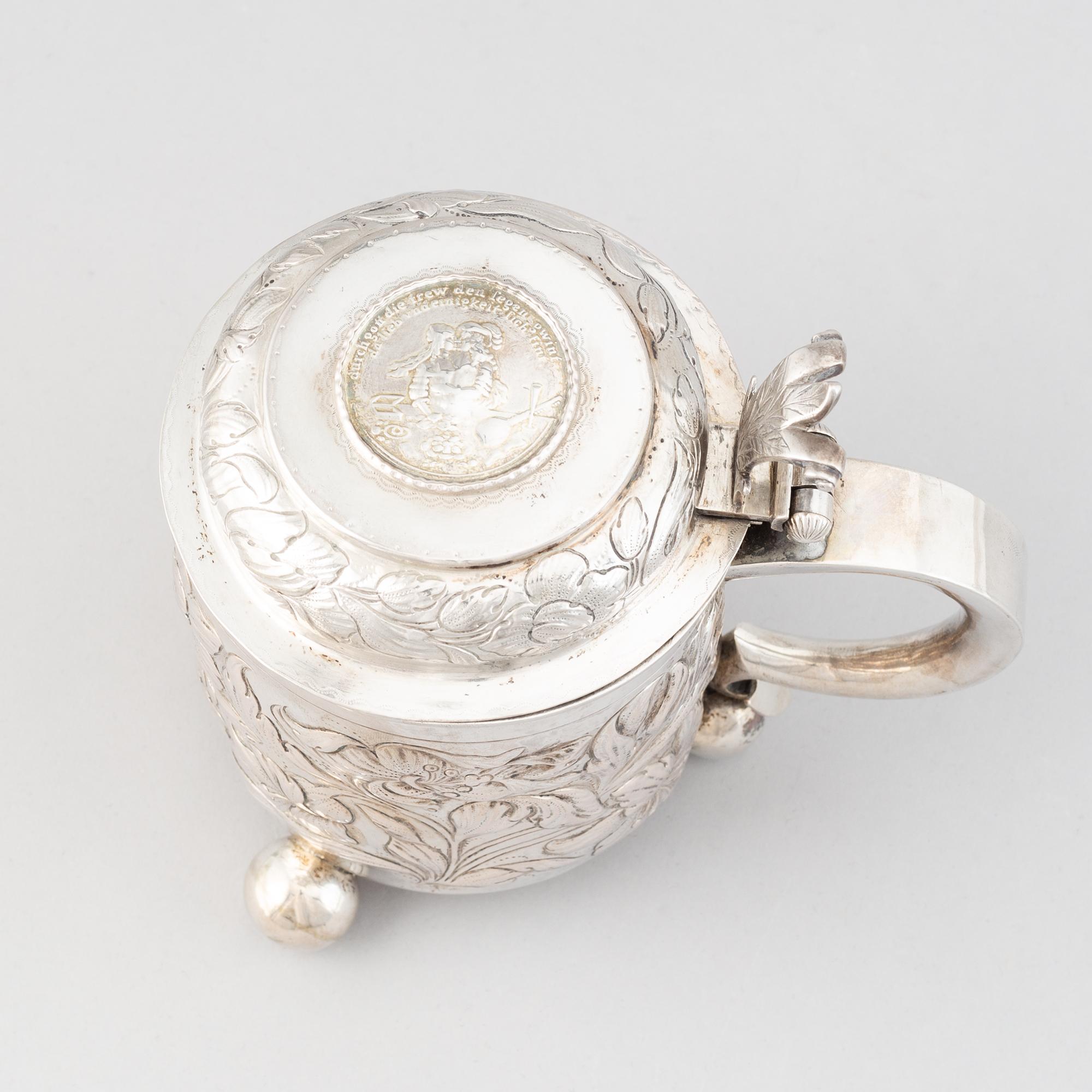 Dryckeskanna, silver, dubbelslagen fantasistämpel, 1800-tal. Barock-stil.