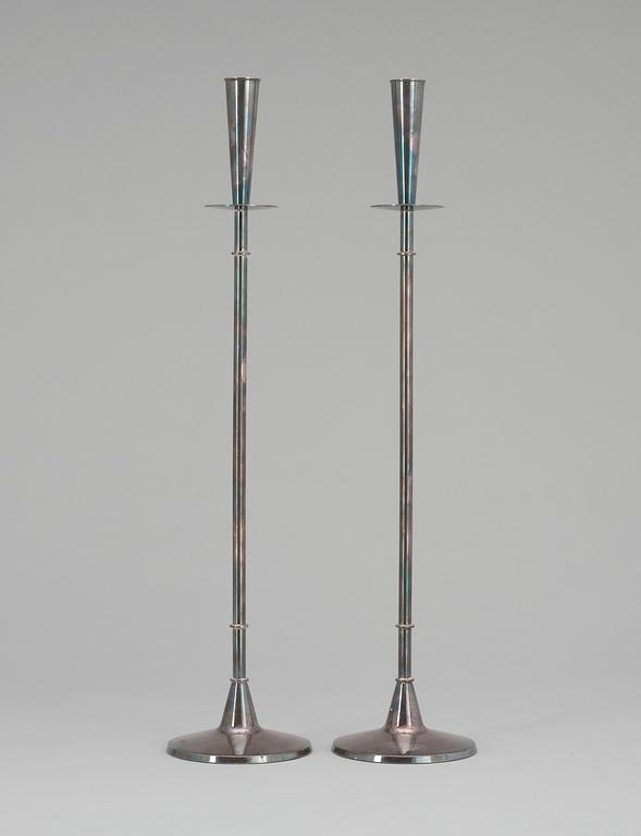 A pair of  silver Swedish candlesticks, maker´s mark Carlson, Göteborg 1962. Design Tore Eldh.