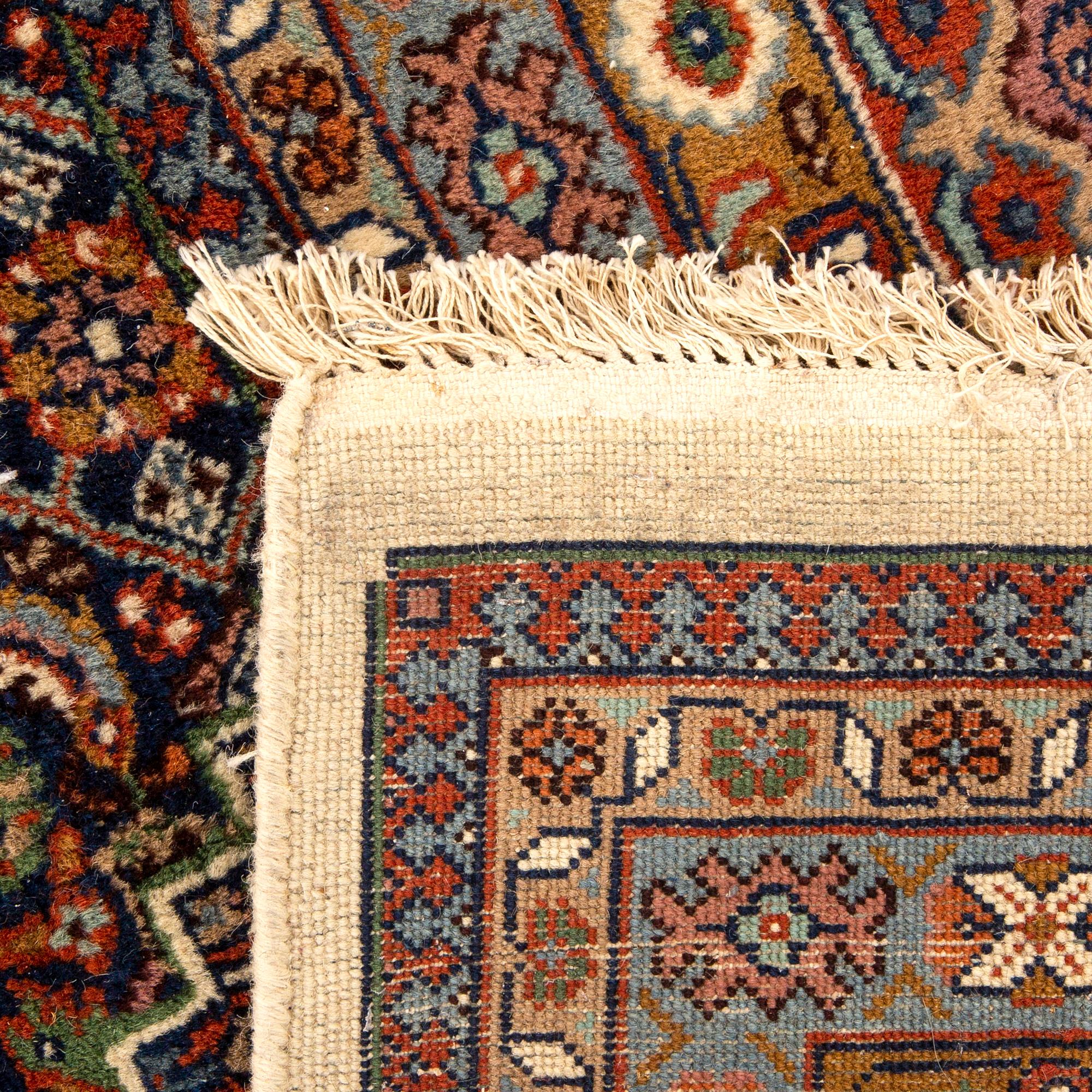 A semiantique Bidjar carpet ca 350 x 263 cm.