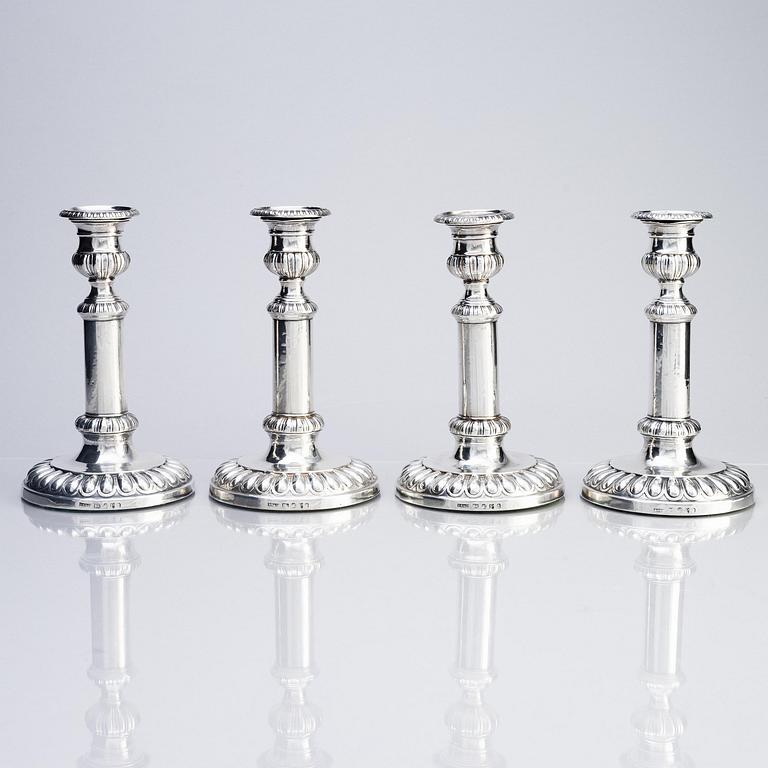 Four English silver candlesticks, marks of John Roberts & Co, Sheffield 1808.
