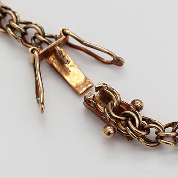 A 14K gold necklace. Aittamäki Ky, Nurmisjärvi 1992.