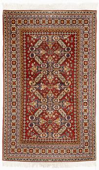 A rug, 215 x 130 cm.