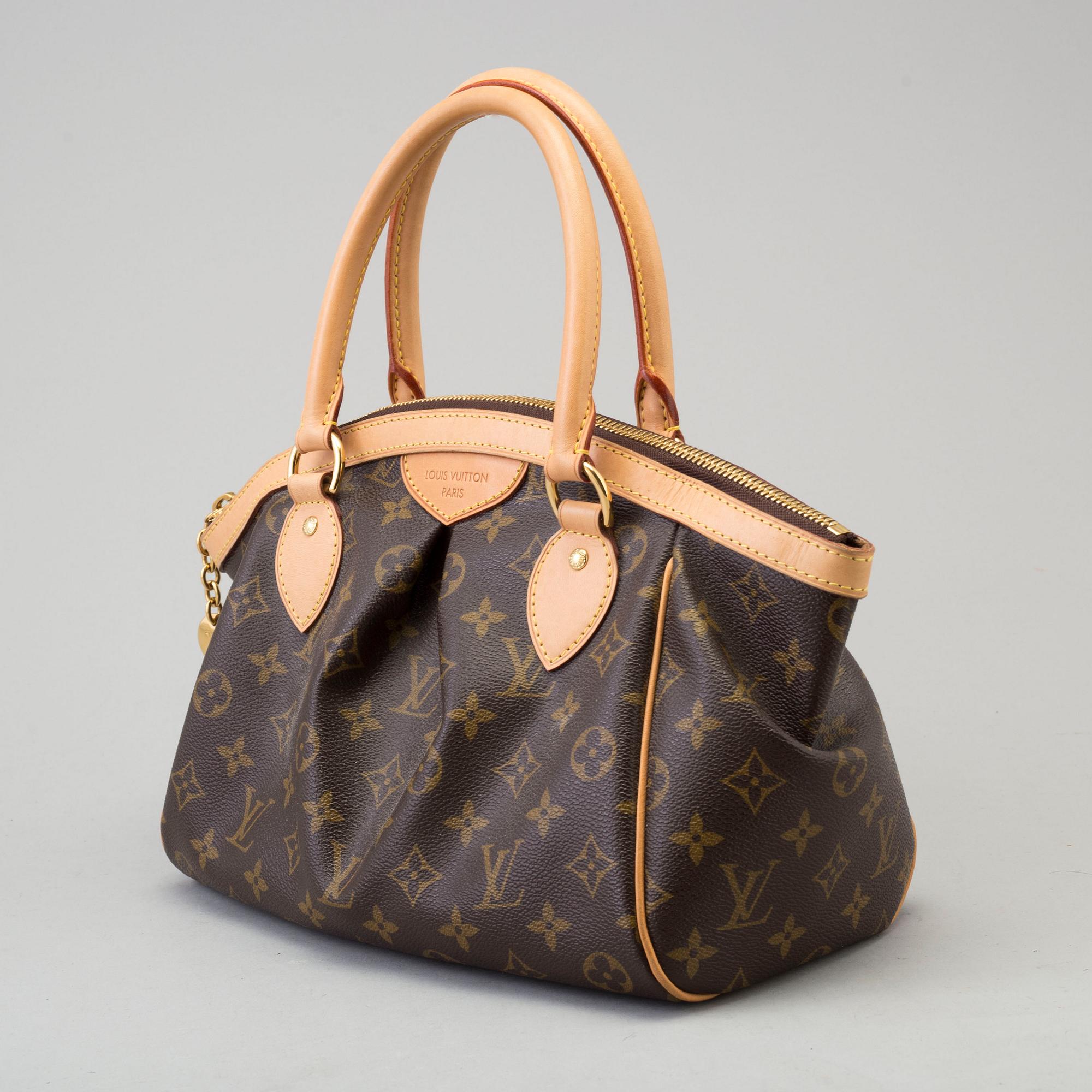 a LOUIS VUITTON 'Tivoli PM' bag.