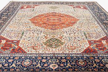 A semi-antique Benlian Tabriz carpet of 'Coronation' design, signed Jabarzade, c. 488 x 367 cm.