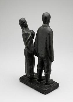 AXEL OLSSON, bemålad gips, bär signatur.