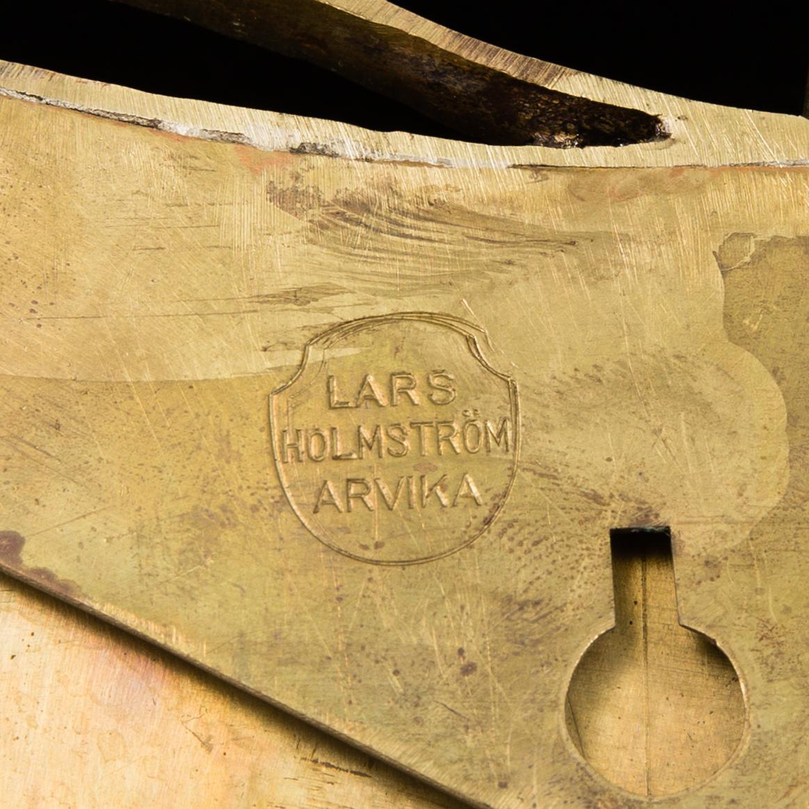 A pair of brass wall-lights by Firma Lars Holström, Arvika.