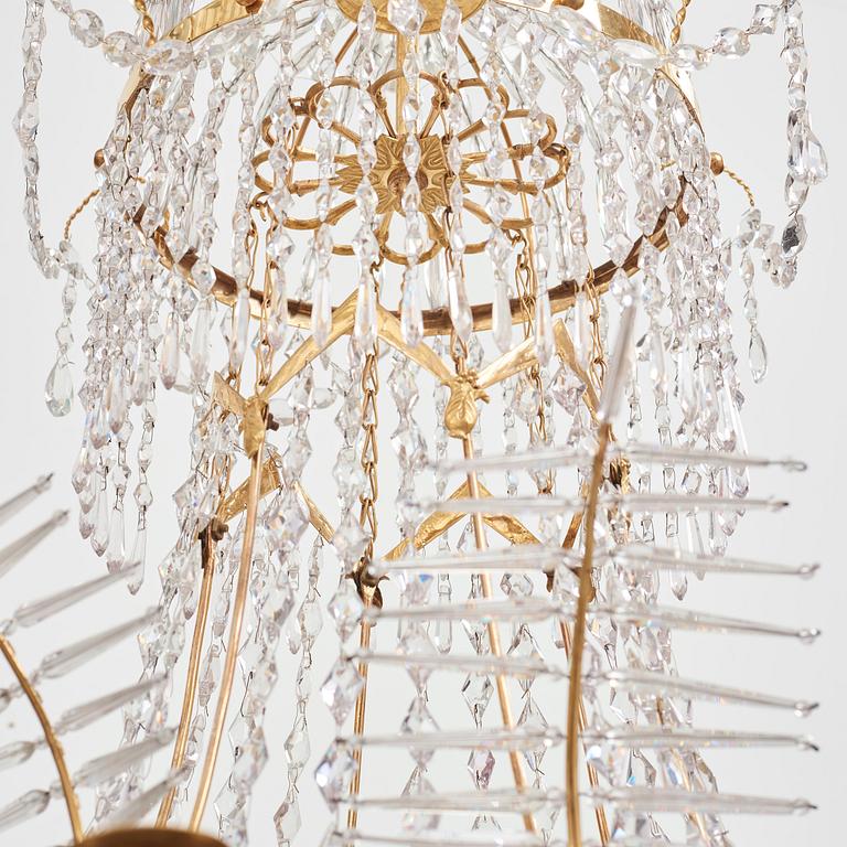 A late Gustavian early 19th century seven-light chandelier by Carl Henrik Brolin (1765-1832, master in Stockholm 1801).