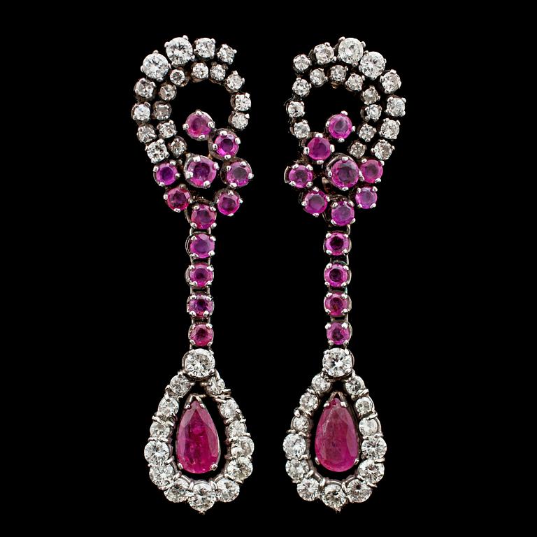 A pair of ruby and brilliant cut diamond earrings, tot. app. 1.80 cts.