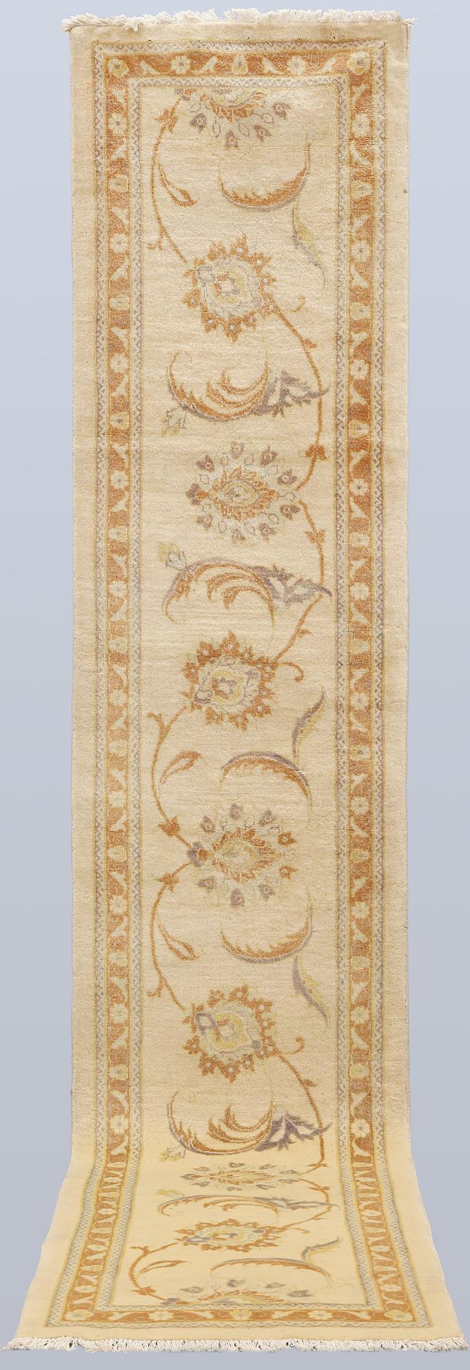 A runner, Ziegler design, c. 398 x 81 cm.