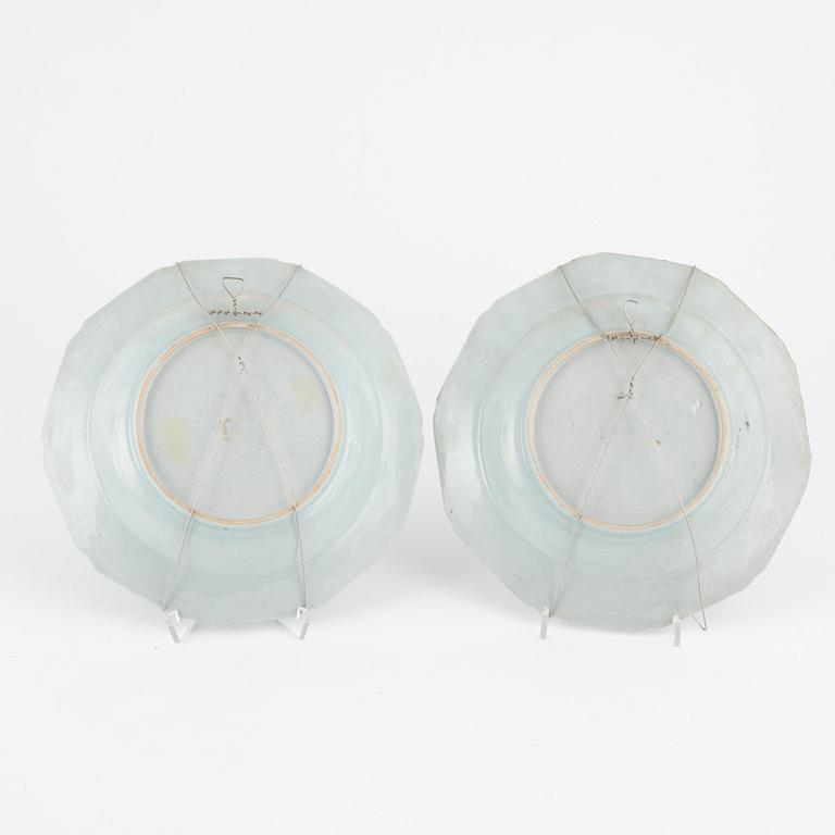 A set of 15 famille rose dinner plates, Qing dynasty, Qianlong and one Canton 19th Century.
