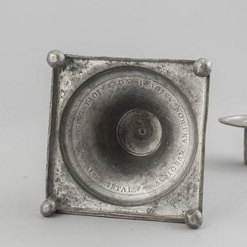 A pair of pewter candle stick by Anjou, Norrköping 1804.