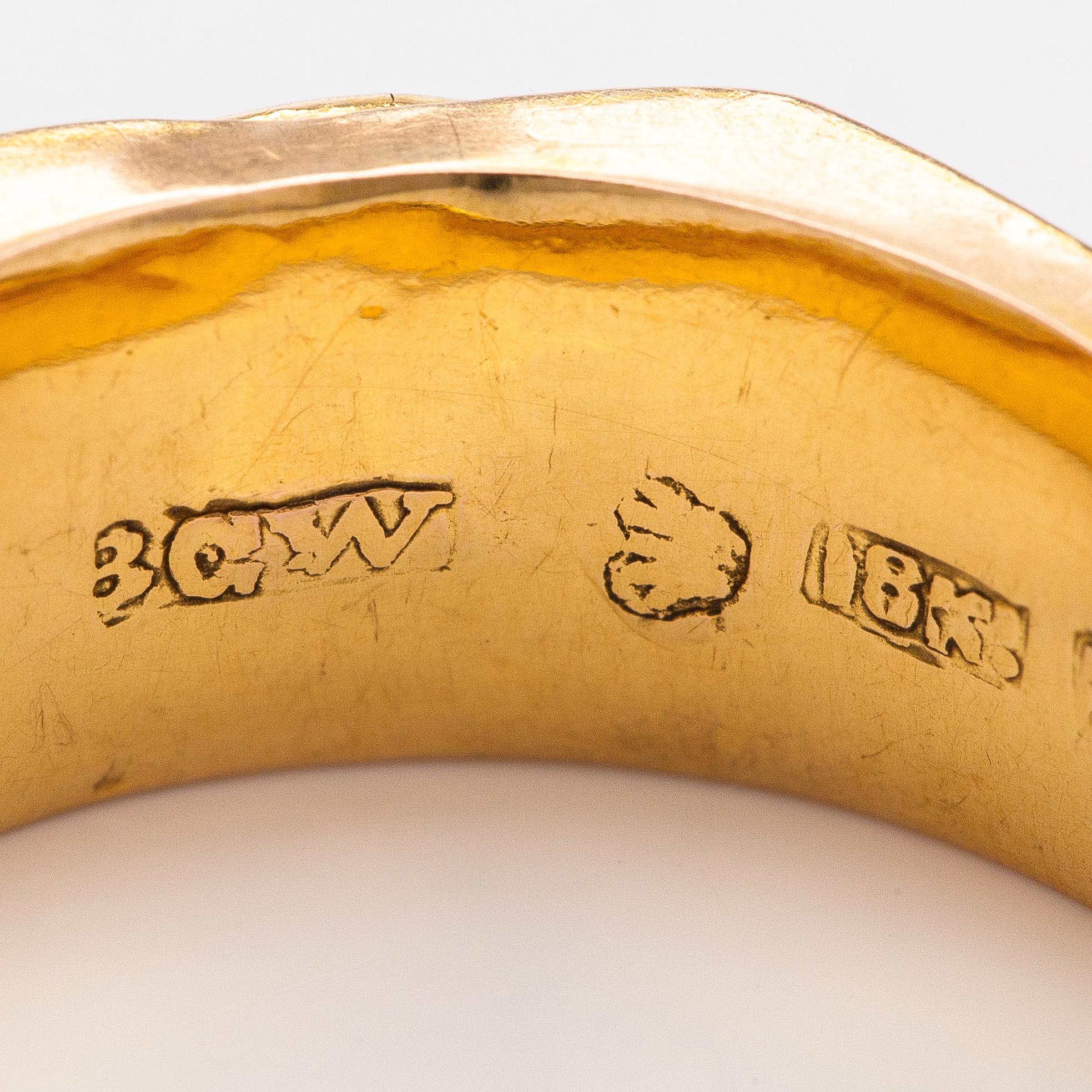 Ring, 18K guld, citrin, granater, Bertil Gottfried Wikström, Nystad, 1876.