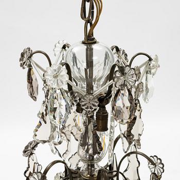 A rococo style chandelier, early 20th Century.