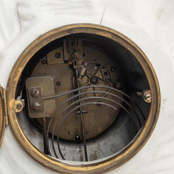 A French Louis XVI bisquit porcelain and ormolu-mounted figural mantel clock, late 18th century.