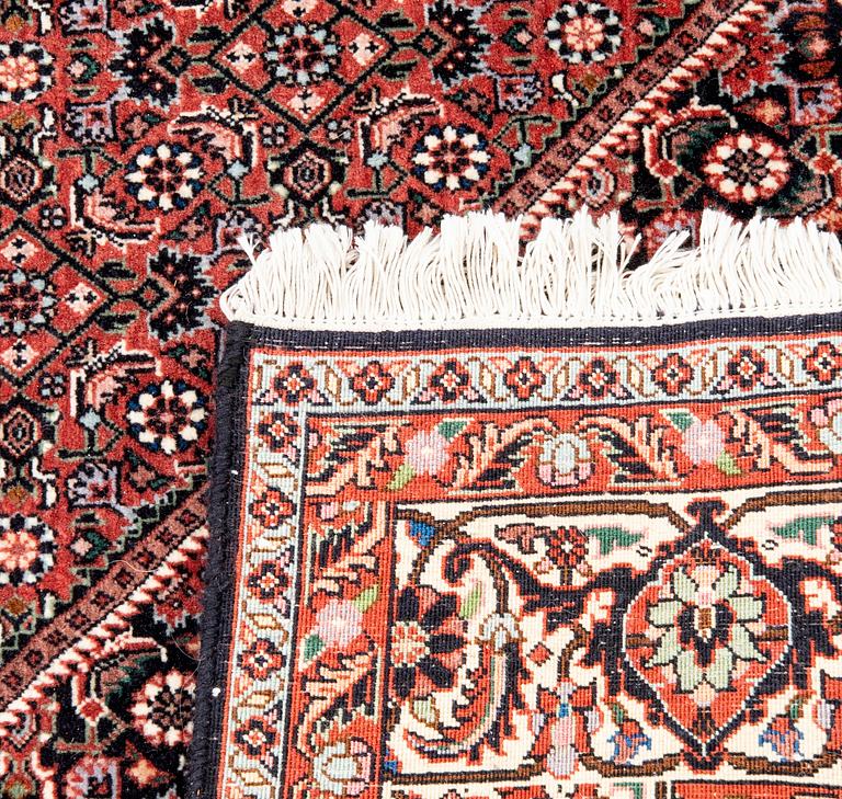 An old Bidjar carpet approx 240x174 cm.
