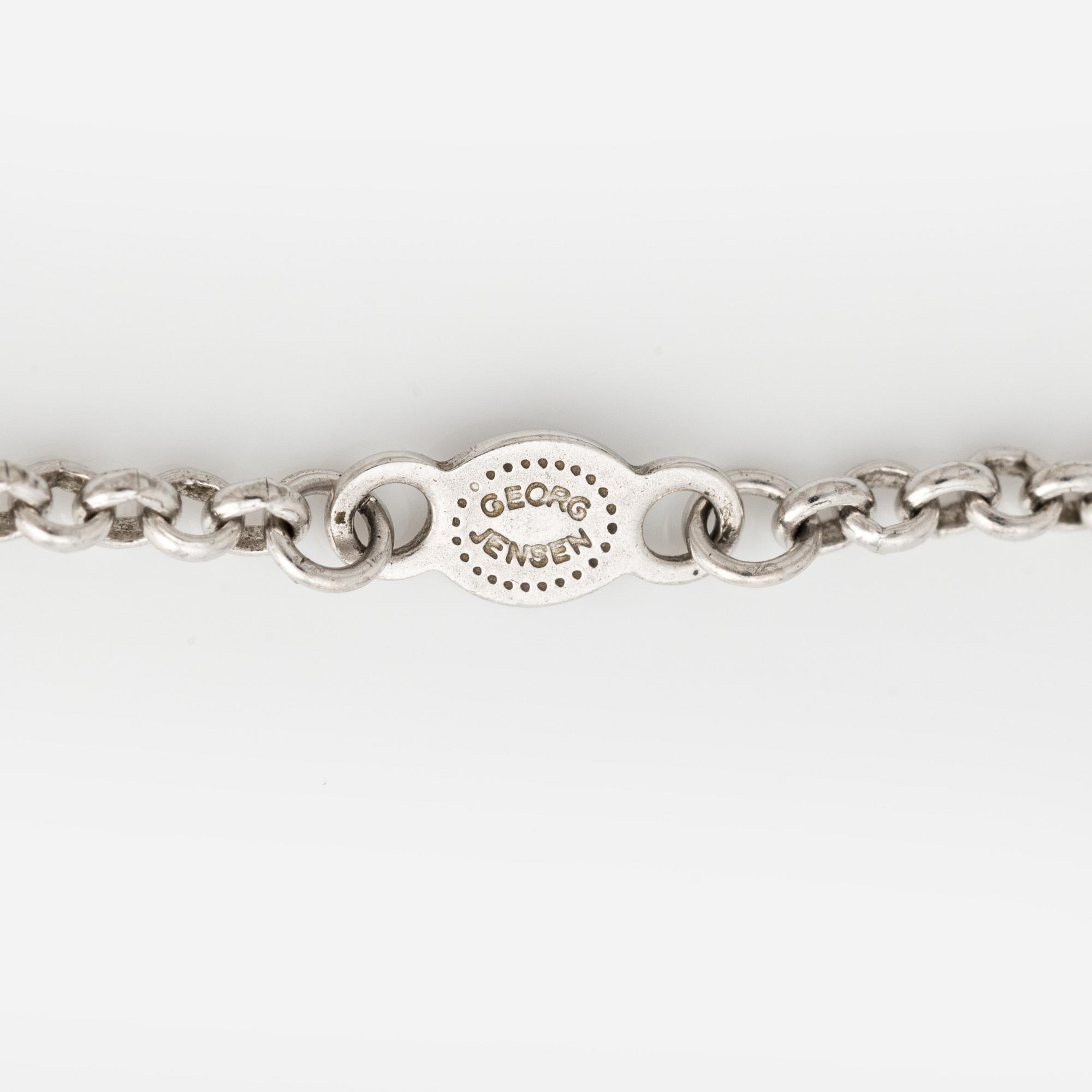 Georg Jensen, collier "Daisy", sterlingsilver med svart och vit emalj.