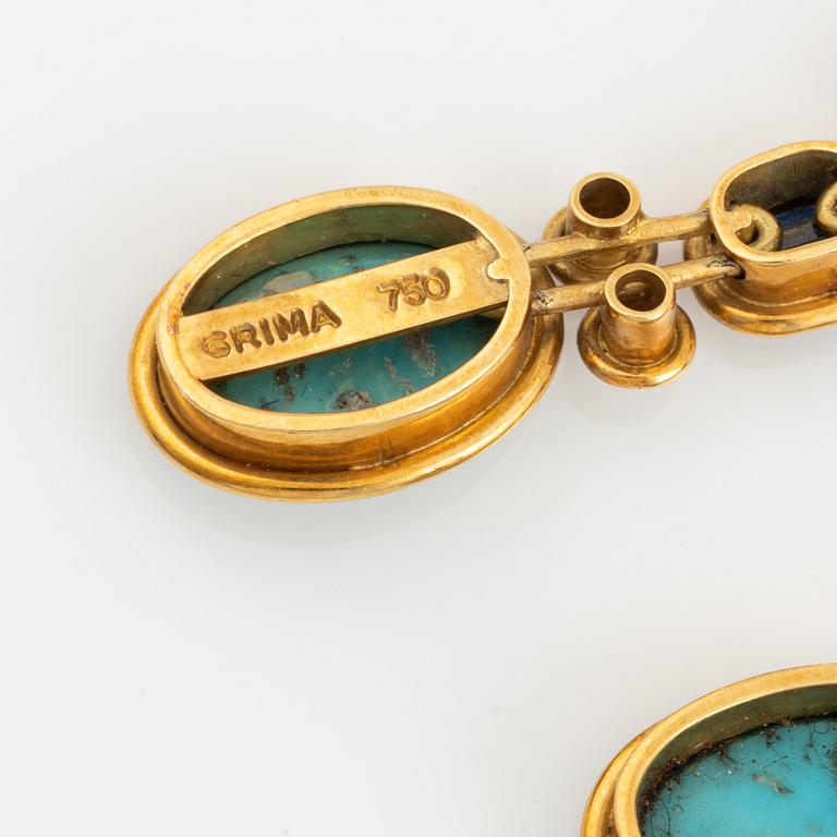 A Grima demi parure comprising a necklace and a pair of earrings.