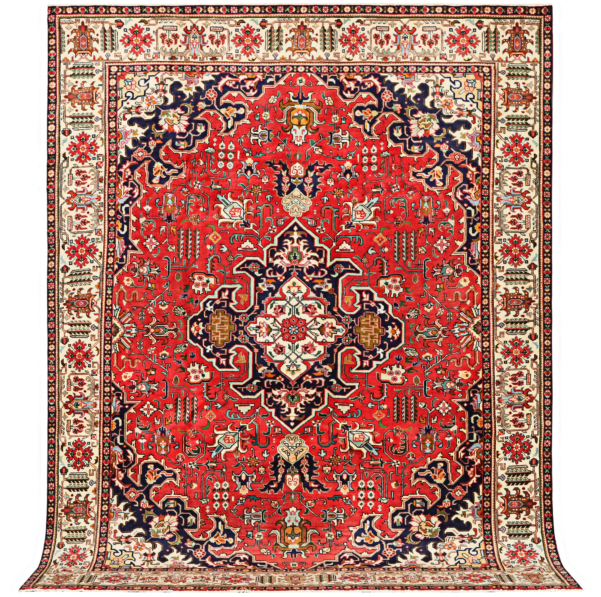 A Tabriz carpet, c. 335 x 257 cm.