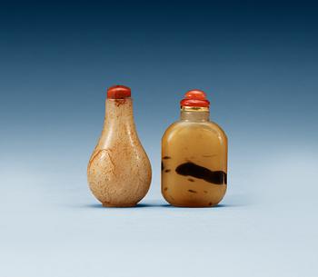 1737. Two snuff bottles with stoppers, Qing dynasty.