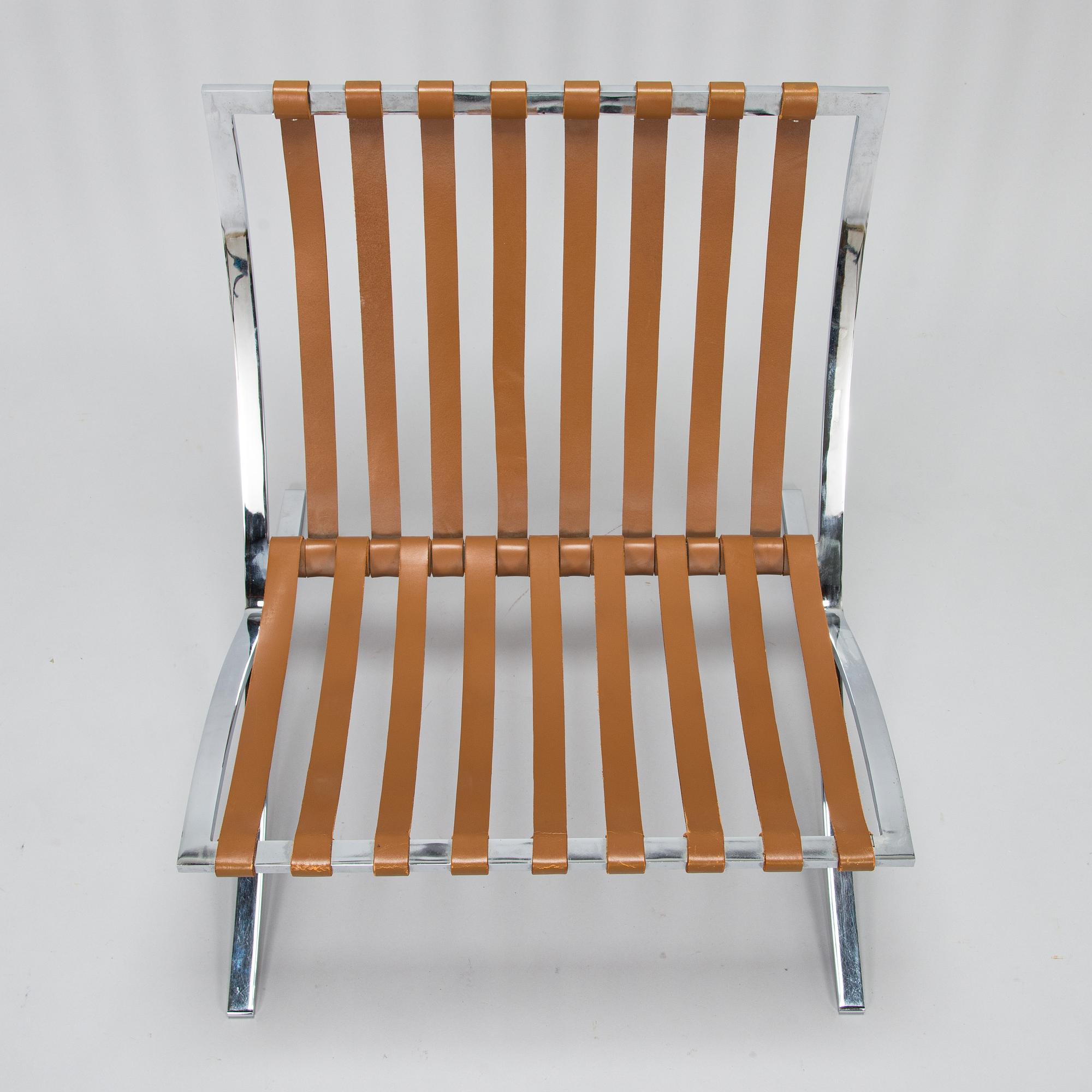 A Ludwig Mies van der Rohe "Barcelona" chair.