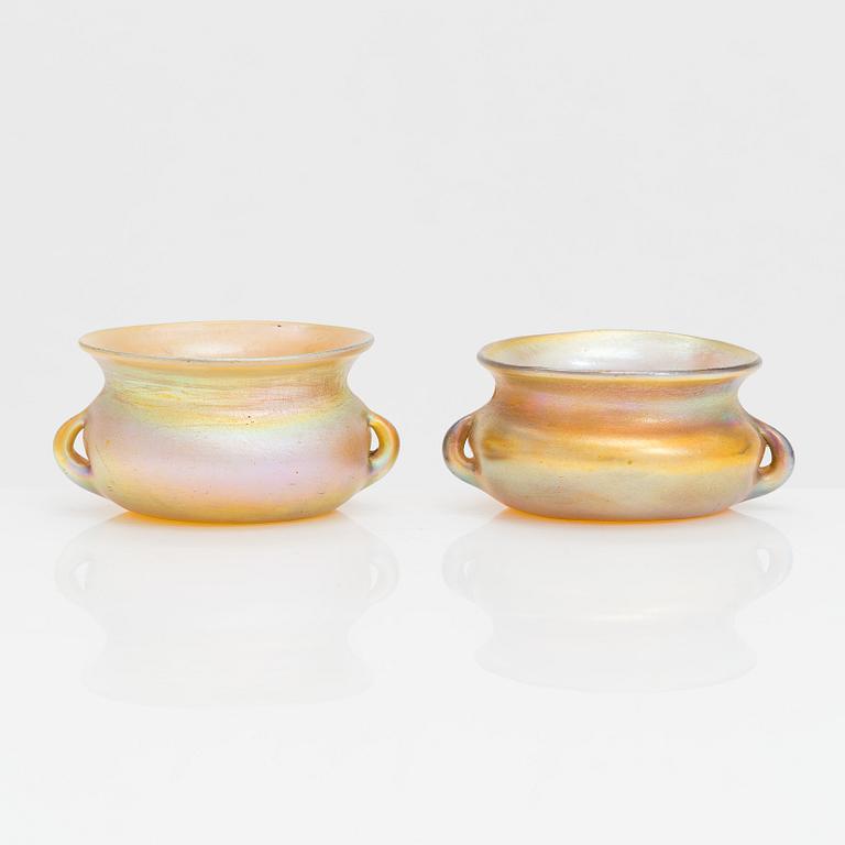 Louis Comfort Tiffany, a pair of glass salt cellars, marked LCT 9823, USA early 20th century.