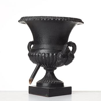 A Louis XVI-style garden urn, circa 1900.