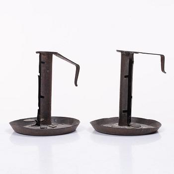 A pair of similar candle holders, 19th century.