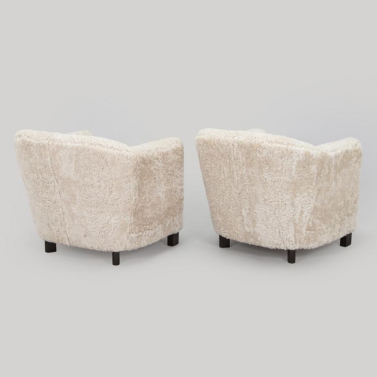 A pair of  1930s/40s. 'Continent' armchairs model 217, Asko, Finland.