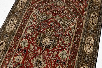 A silk Qum rug, c. 172 x 105 cm.