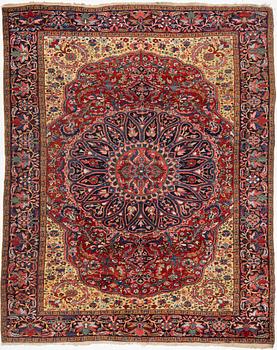 A semi-antique Ahar carpet, c 335 x 275 cm.