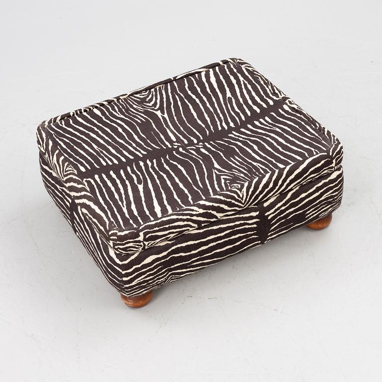 Josef Frank, a model 336 ottoman, Svenskt Tenn.
